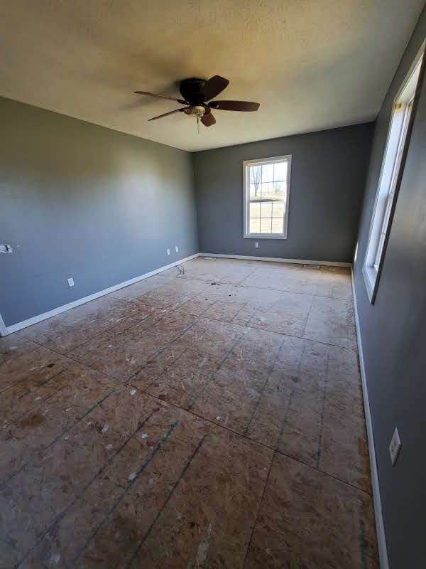 573 Womack Road Bethpage, TN 37022 - Photo 14 of 21 a view of empty room with windows
