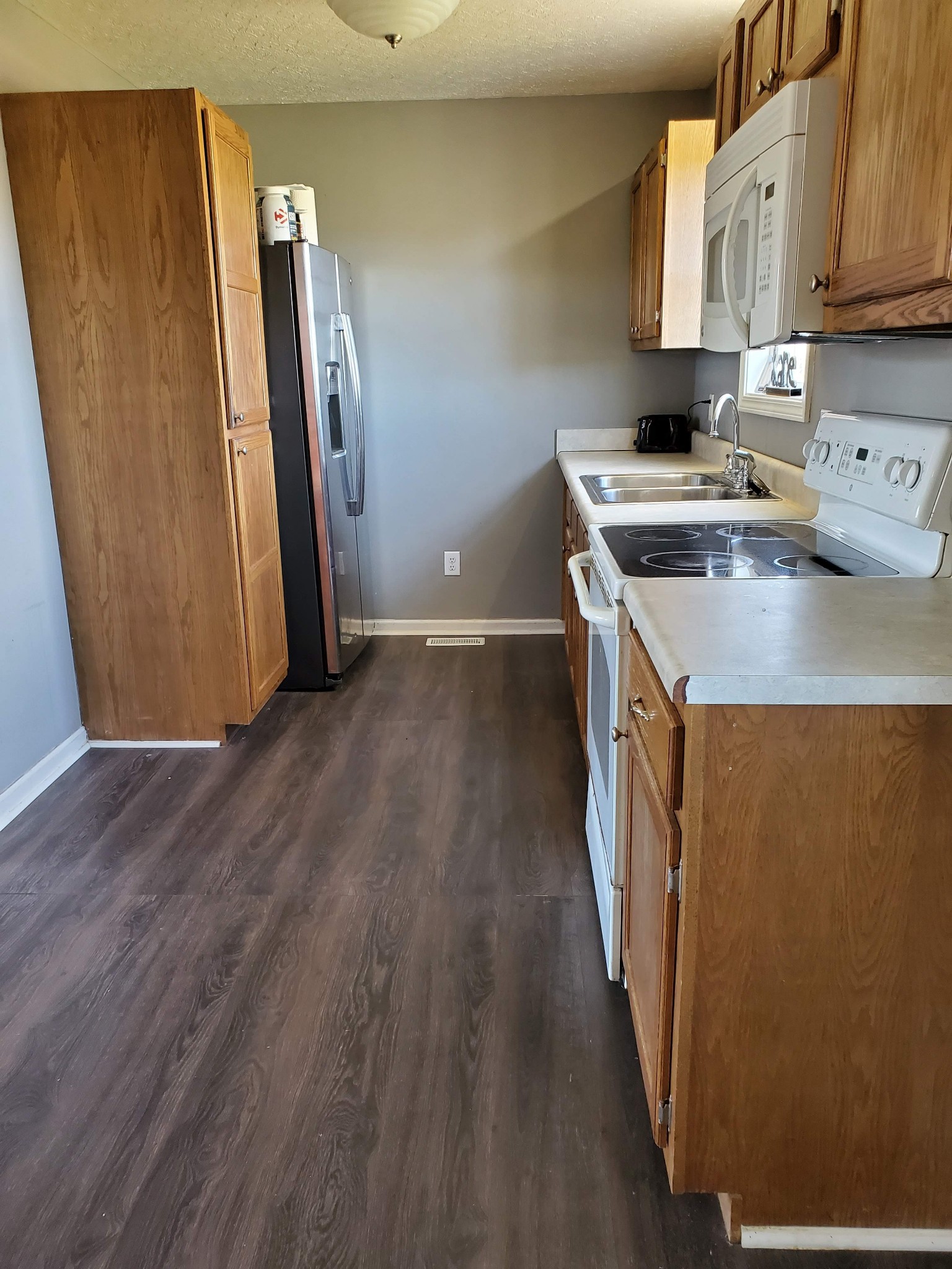 573 Womack Road Bethpage, TN 37022 - Photo 5 of 21 an entryway with wooden floor