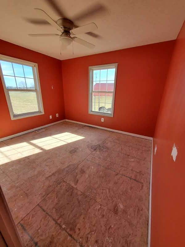 573 Womack Road Bethpage, TN 37022 - Photo 9 of 21 an empty room with windows