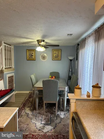 a workspace with furniture and window