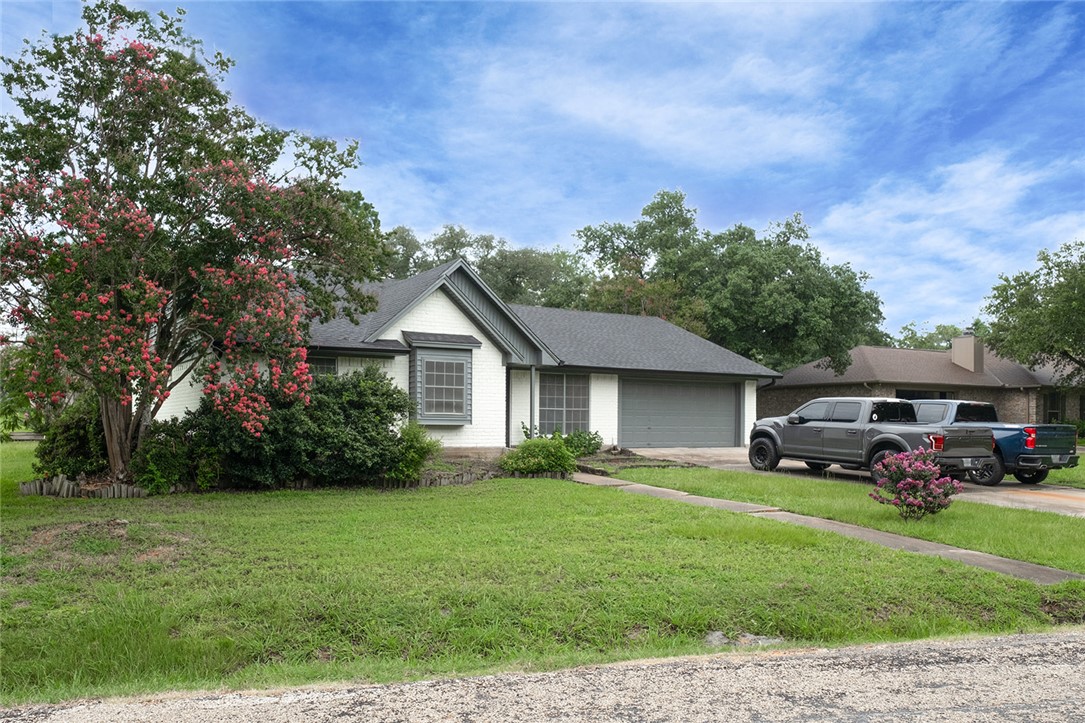 2004 Pinewood Drive Bryan, TX 77807 - Photo 11 of 12 a house view with a garden space