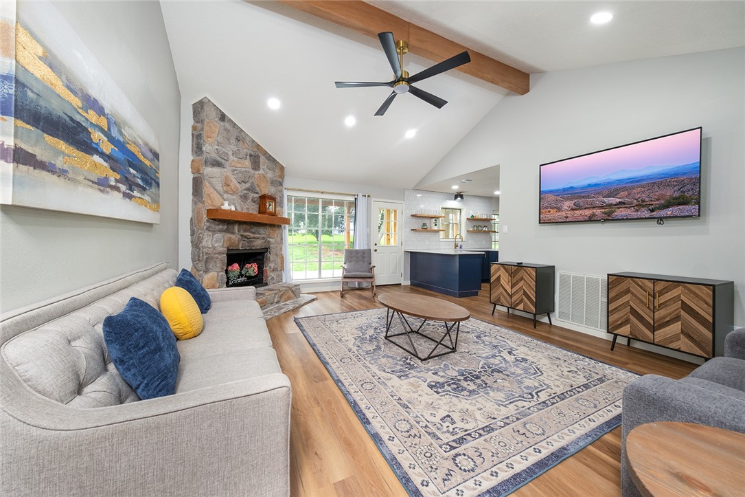 2004 Pinewood Drive Bryan, TX 77807 - Photo 2 of 12 a living room with furniture and a rug