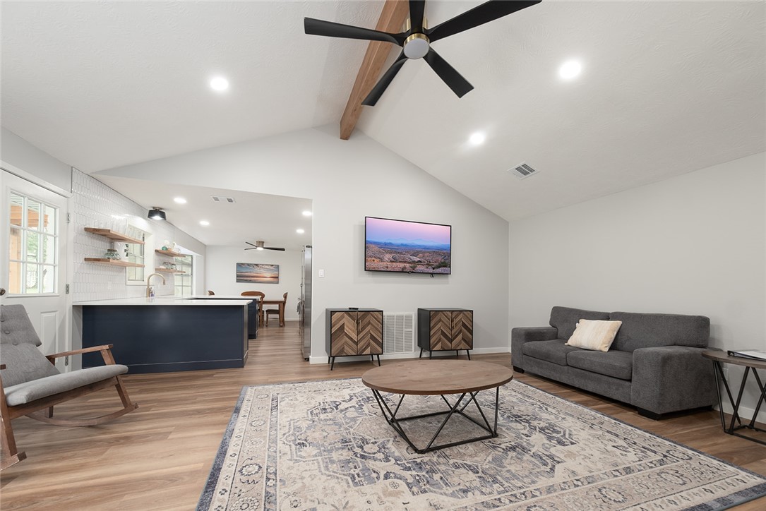 2004 Pinewood Drive Bryan, TX 77807 - Photo 3 of 12 a living room with furniture and a wooden floor