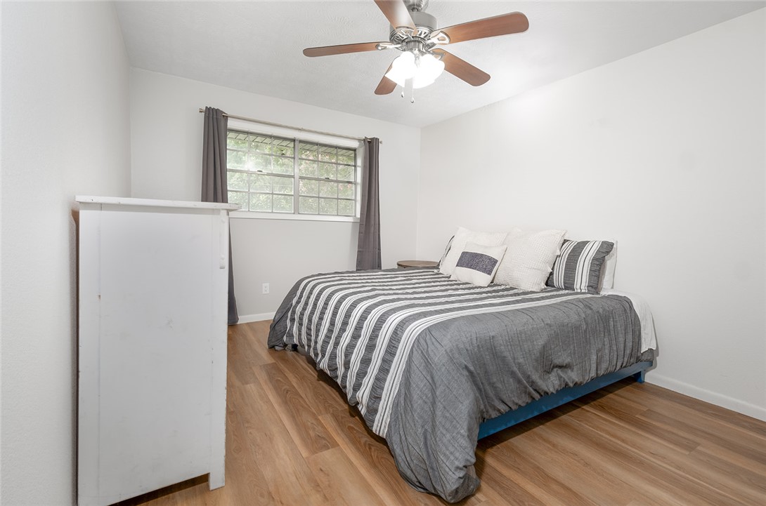 2004 Pinewood Drive Bryan, TX 77807 - Photo 8 of 12 a bedroom with a bed and window