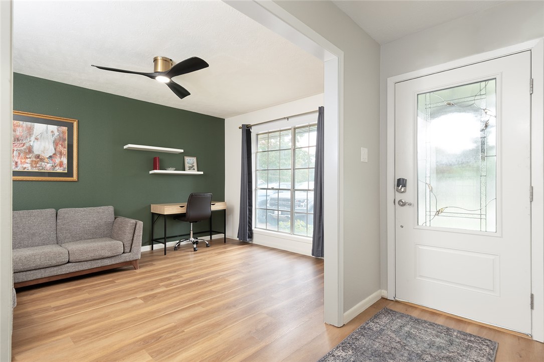 2004 Pinewood Drive Bryan, TX 77807 - Photo 10 of 12 a living room with furniture and a window