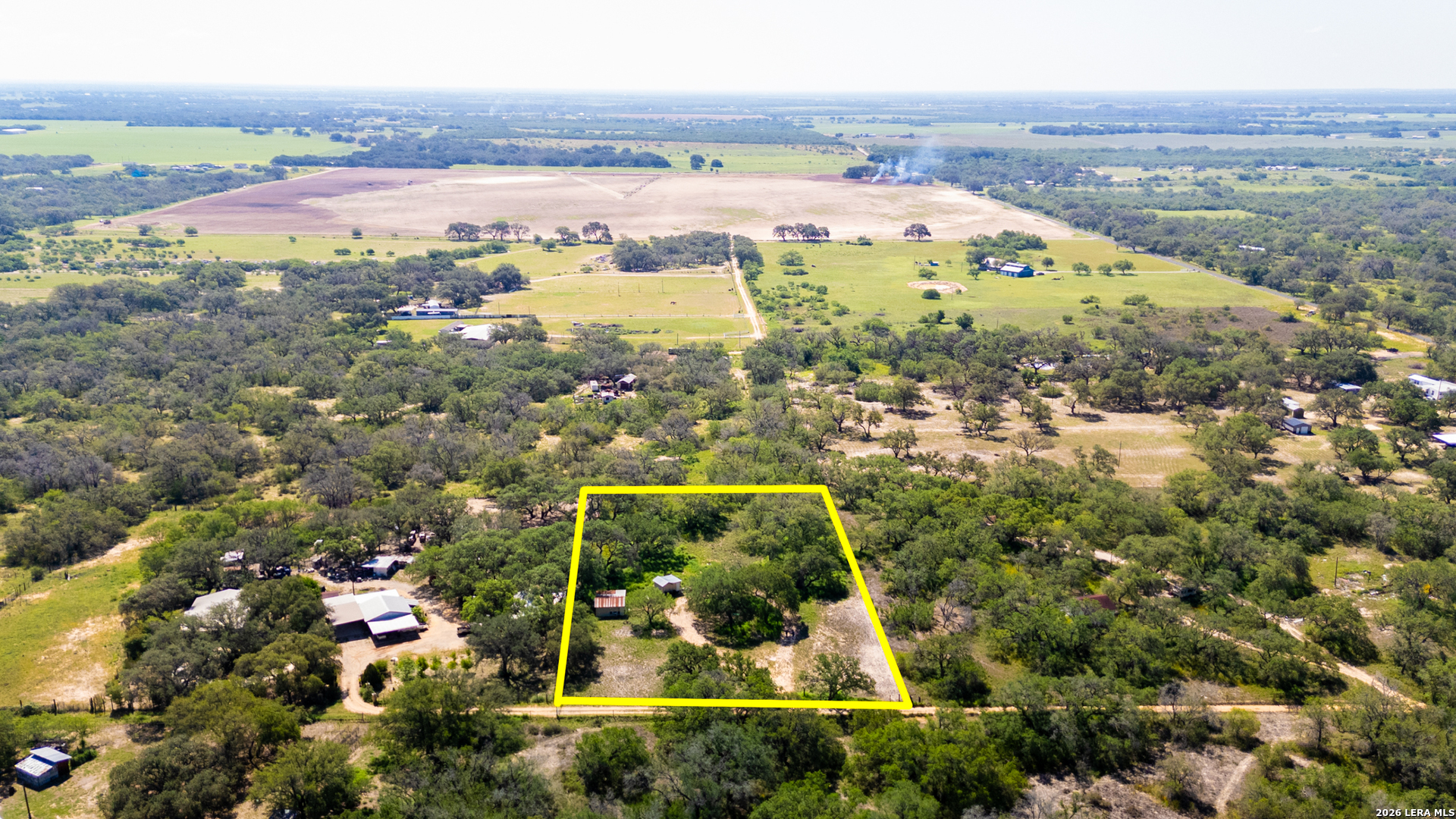 230 P R D65 Poteet, TX 78065 - Photo 26 of 29 an aerial view of residential houses with outdoor space