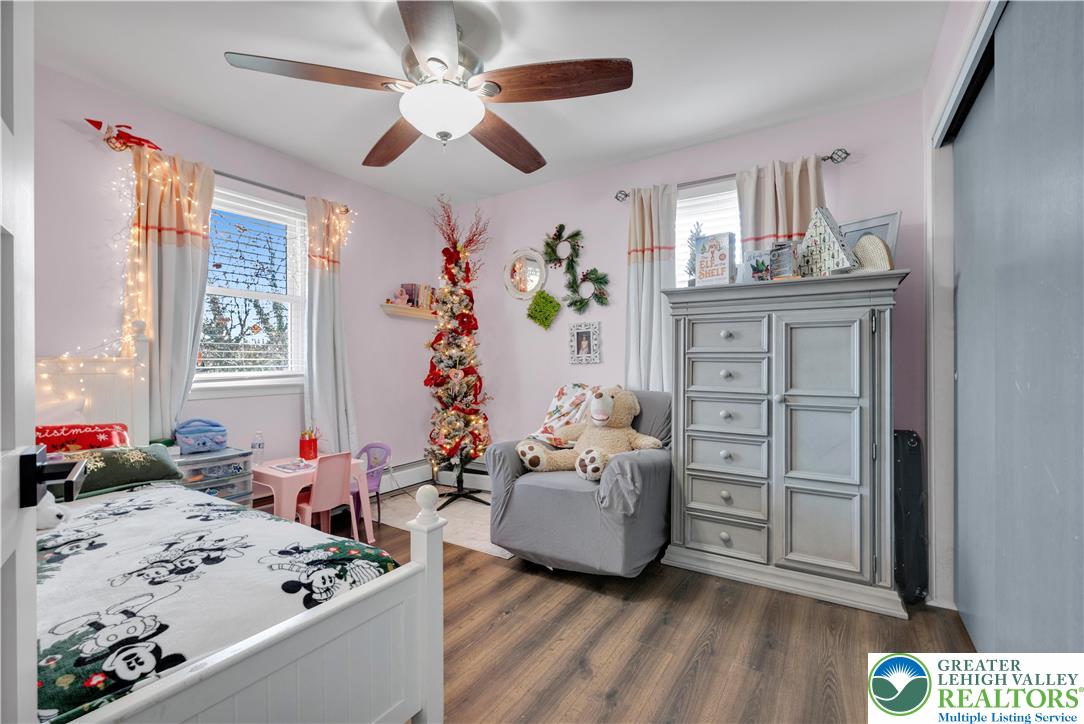 501 Creek Road Bath, PA 18014 - Photo 20 of 50 a living room with furniture and wooden floor