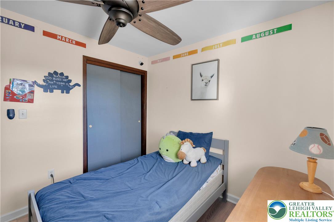 501 Creek Road Bath, PA 18014 - Photo 22 of 50 a bedroom with a bed and cupboard