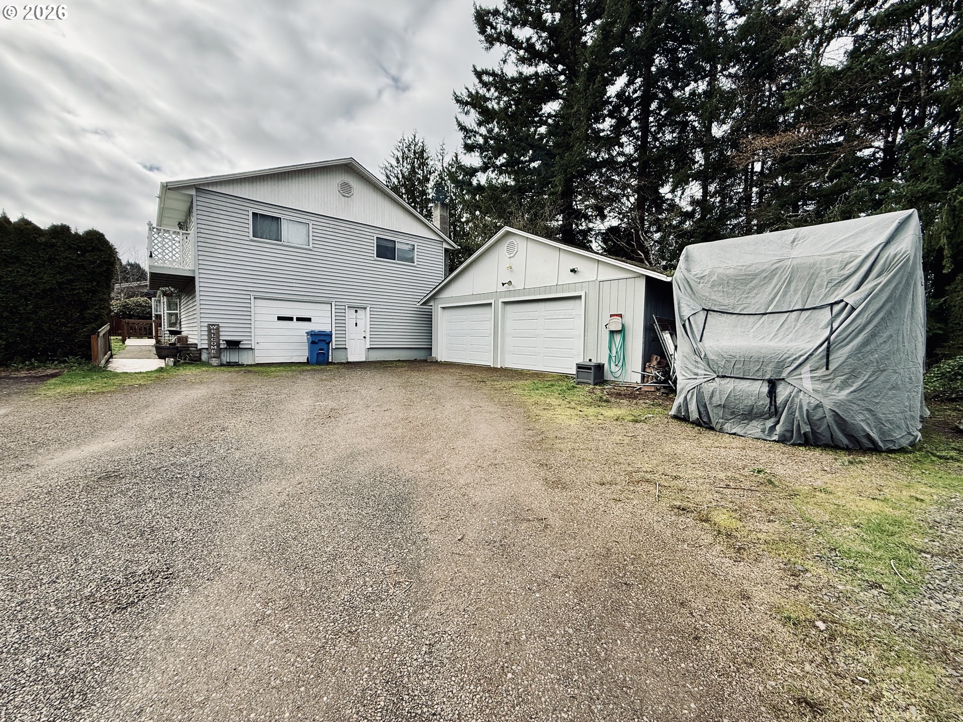 105 Timberline Drive Castle Rock, WA 98611 - Photo 1 of 21 a view of a house with backyard and a tree