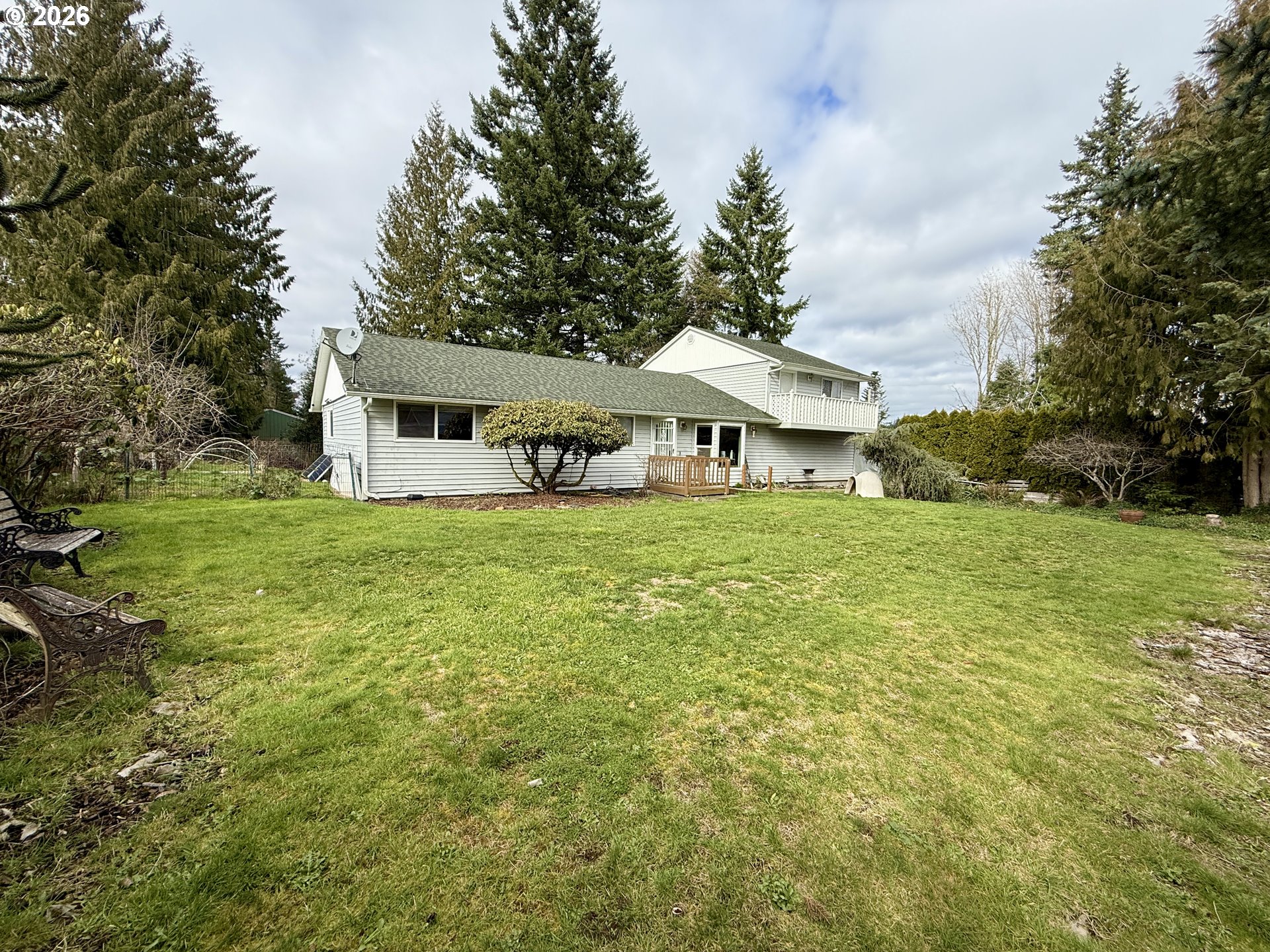 105 Timberline Drive Castle Rock, WA 98611 - Photo 19 of 21 a front view of a house with garden