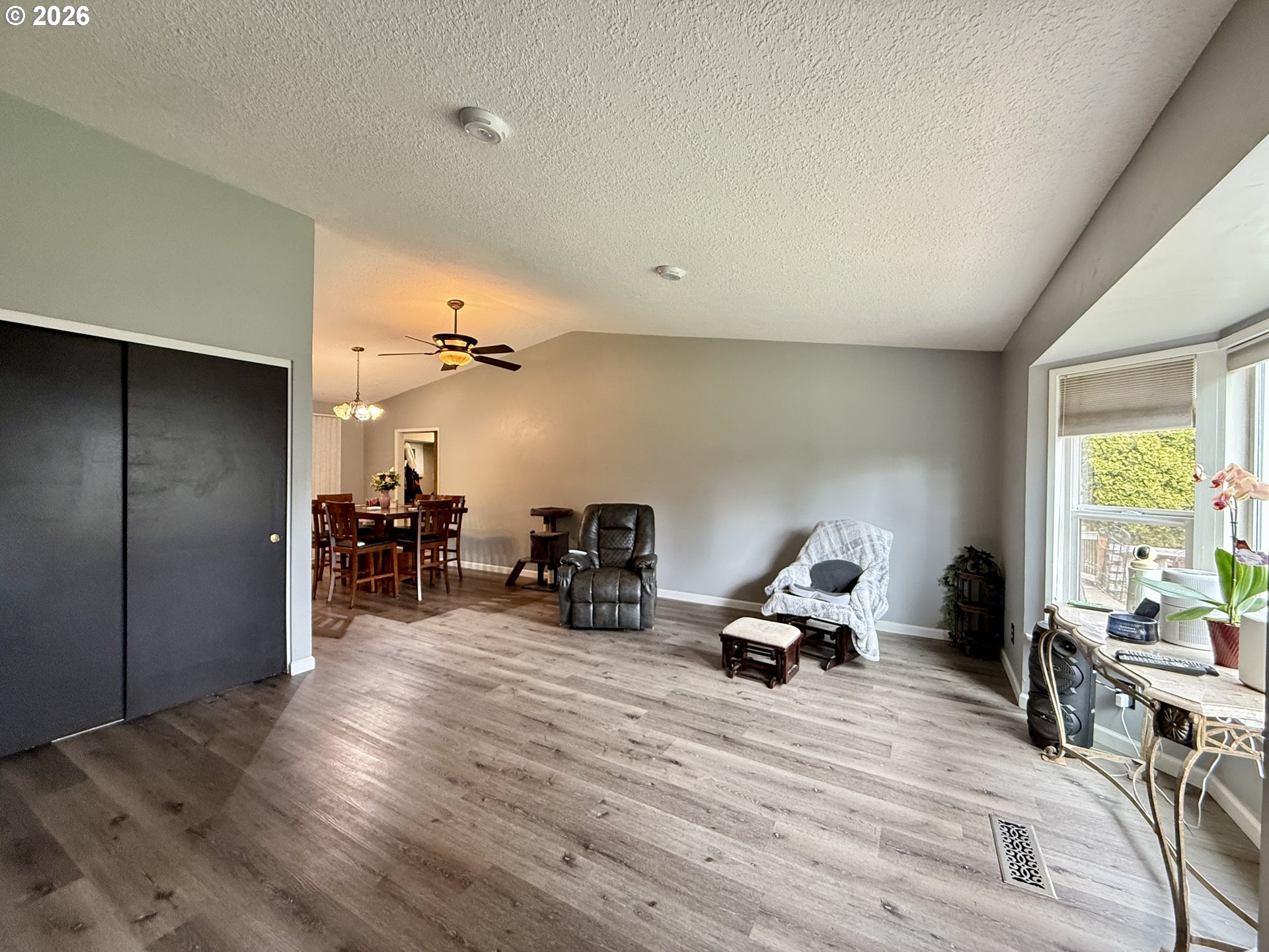 105 Timberline Drive Castle Rock, WA 98611 - Photo 4 of 21 a room with furniture and a wooden floor