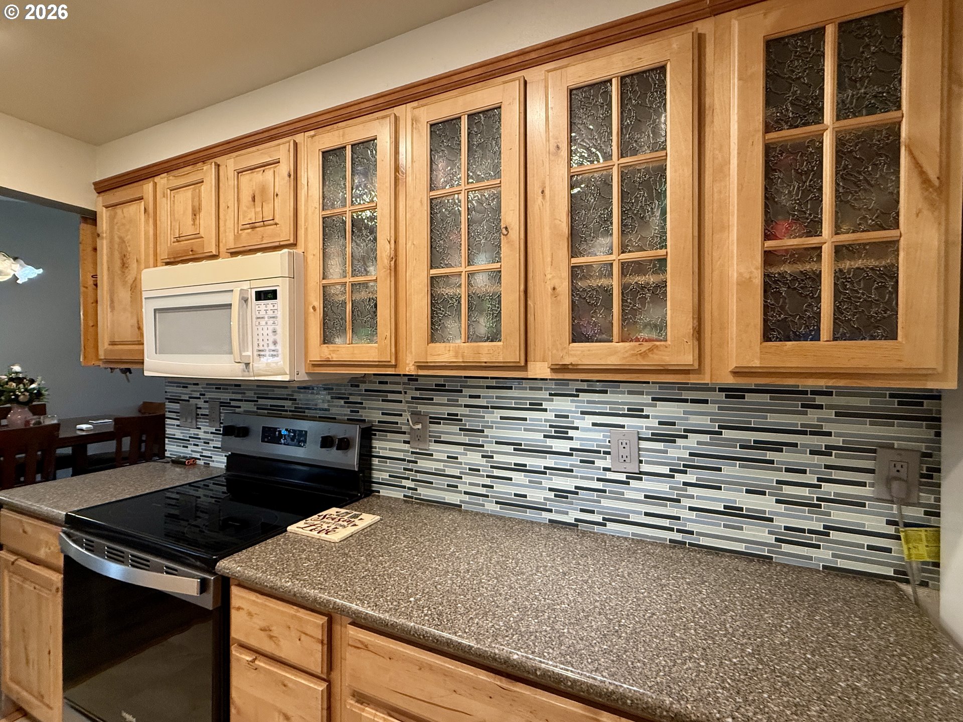 105 Timberline Drive Castle Rock, WA 98611 - Photo 6 of 21 a kitchen that has a sink and a stove