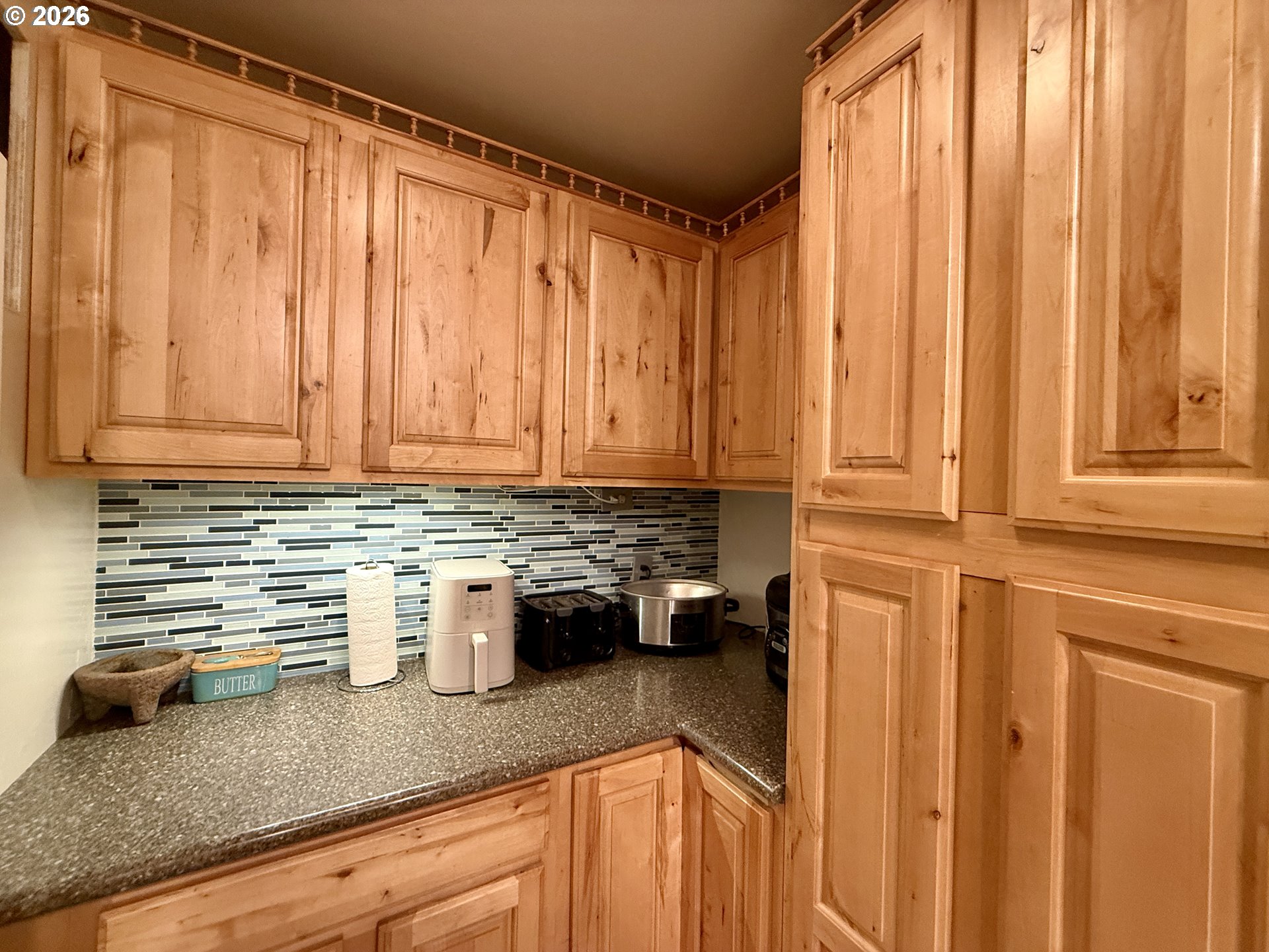 105 Timberline Drive Castle Rock, WA 98611 - Photo 7 of 21 a view of a kitchen with sink and a refrigerator