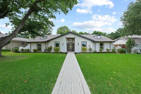 a view of outdoor space yard and front view of a house
