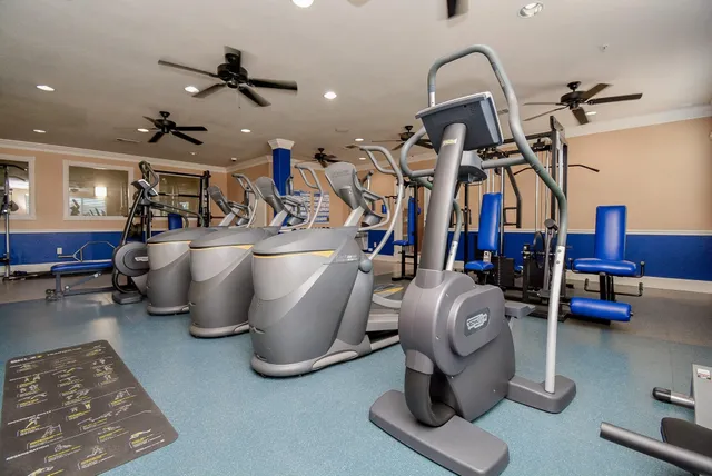 a kitchen with stainless steel appliances granite countertop a sink and dishwasher with wooden floor