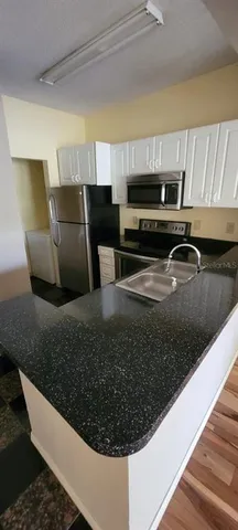 a view of kitchen island with furniture