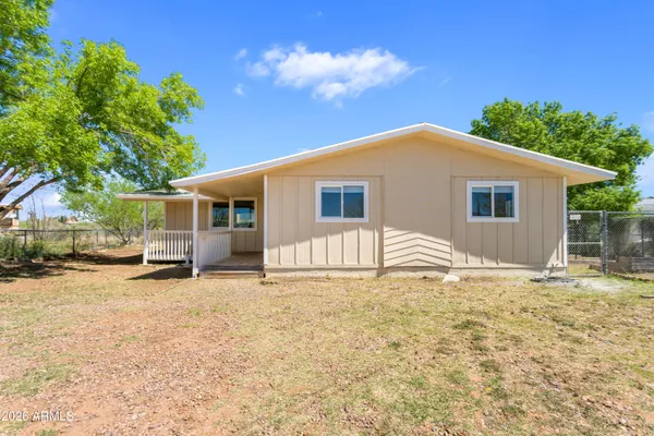 a view of a house with a patio