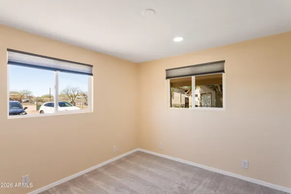 a view of a hallway with closet area