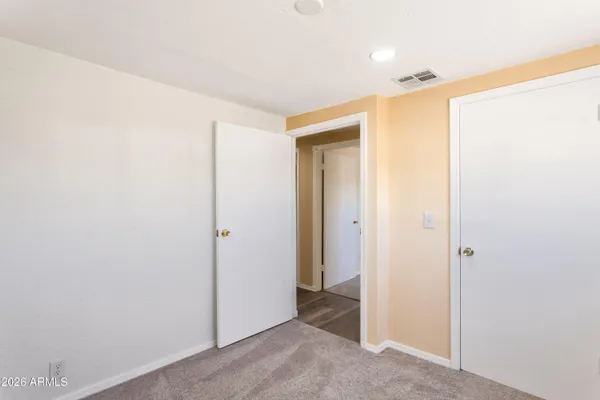 a bathroom with a sink a vanity and a mirror