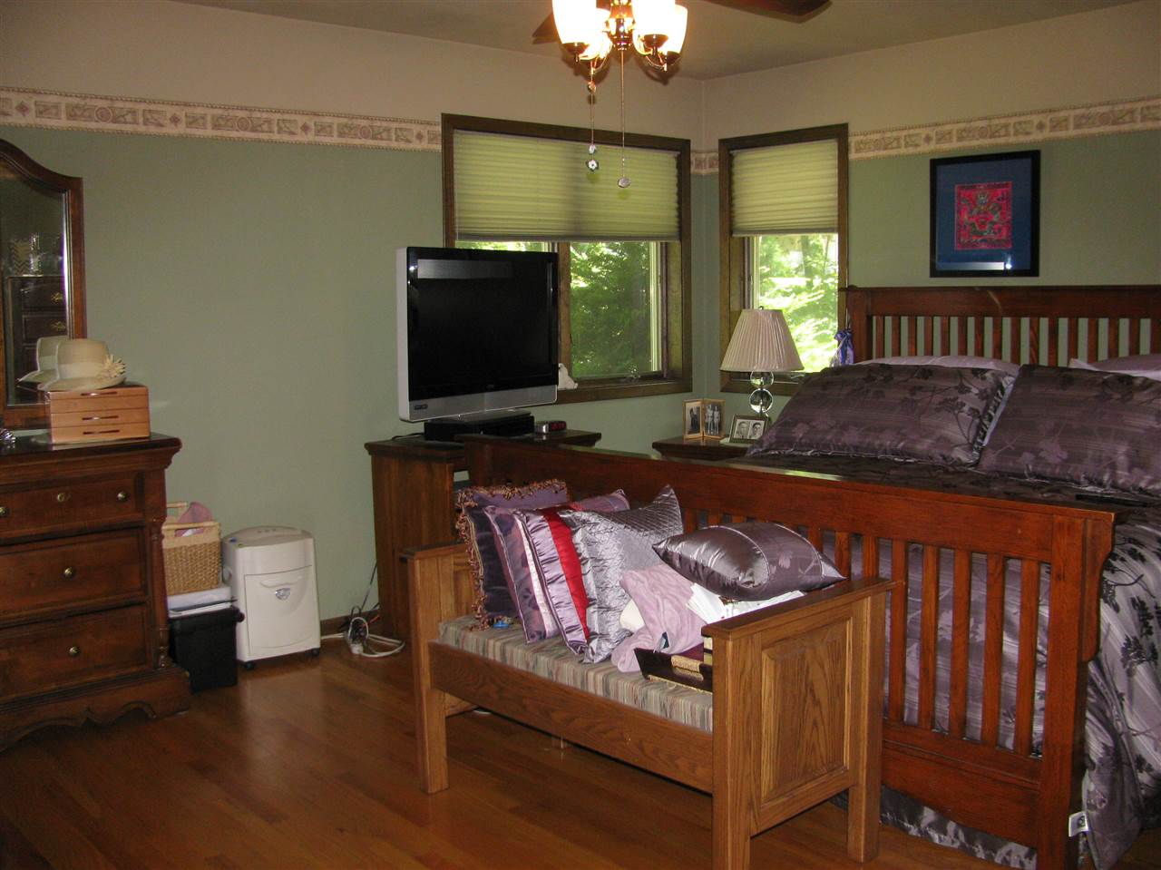 572 Baintree Road Lake Summerset, IL 61019 - Photo 14 of 24 a living room with furniture and a flat screen tv