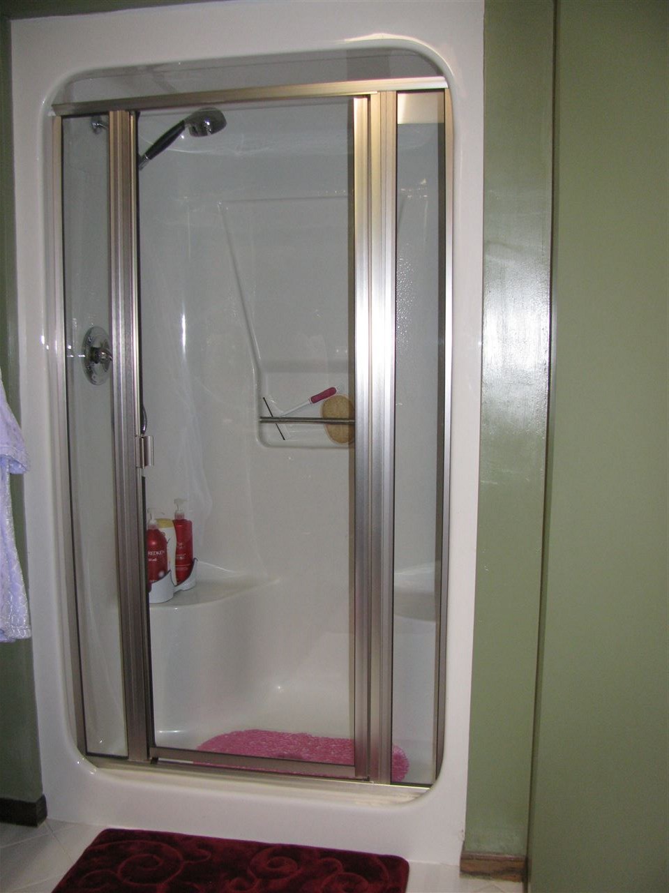 572 Baintree Road Lake Summerset, IL 61019 - Photo 19 of 24 a bathroom with a shower and a mirror