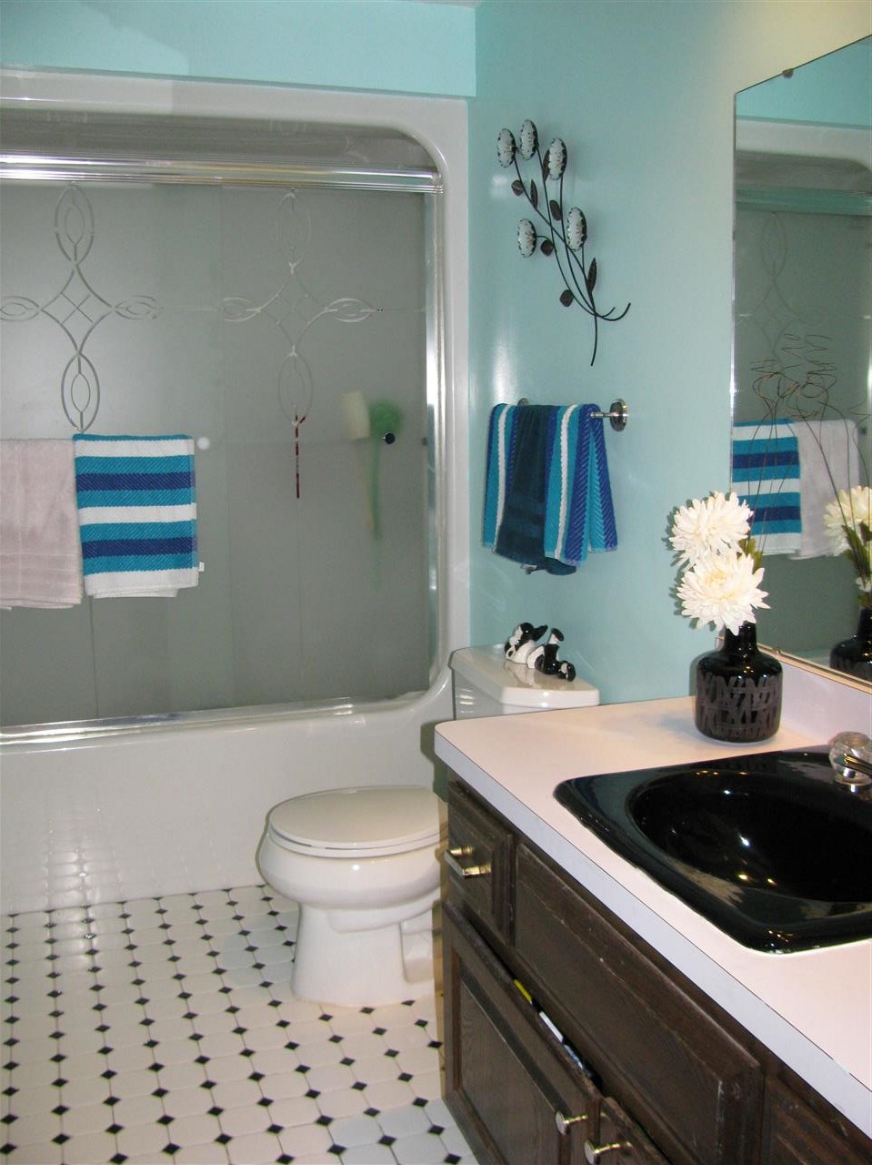 572 Baintree Road Lake Summerset, IL 61019 - Photo 24 of 24 a bathroom with a sink a toilet and a mirror