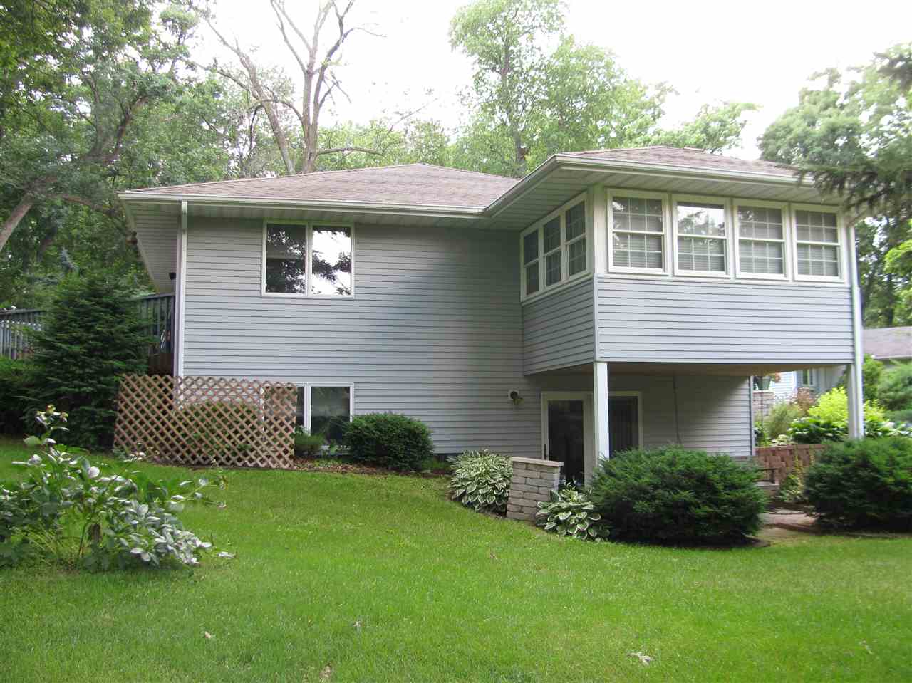 572 Baintree Road Lake Summerset, IL 61019 - Photo 3 of 24 a front view of a house with a yard