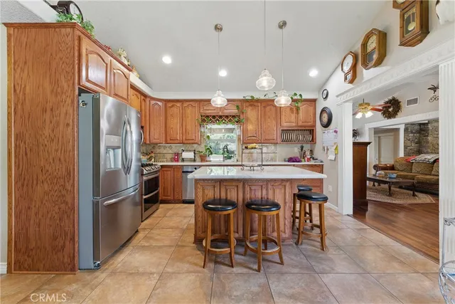 a dining room with furniture entryway and wooden floor