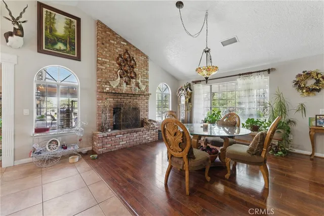 a bathroom with a sink vanity mirror bathtub and toilet