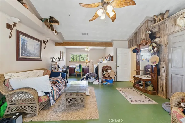 a open kitchen with granite countertop a stove top oven a sink dishwasher and a refrigerator