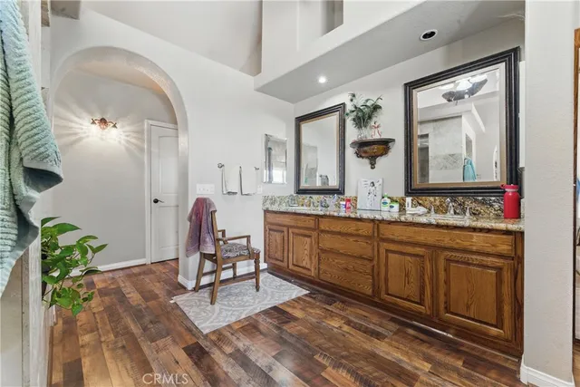 a bed sitting in a room next to a window