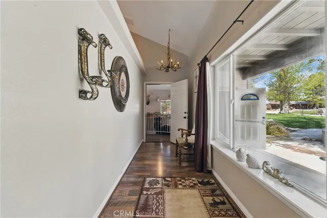 a white toilet sitting next to a shower curtain