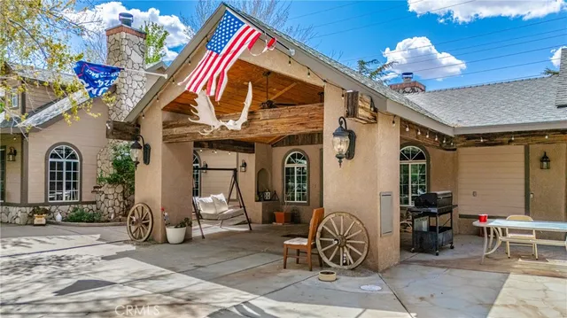 a front view of a house with garden and porch