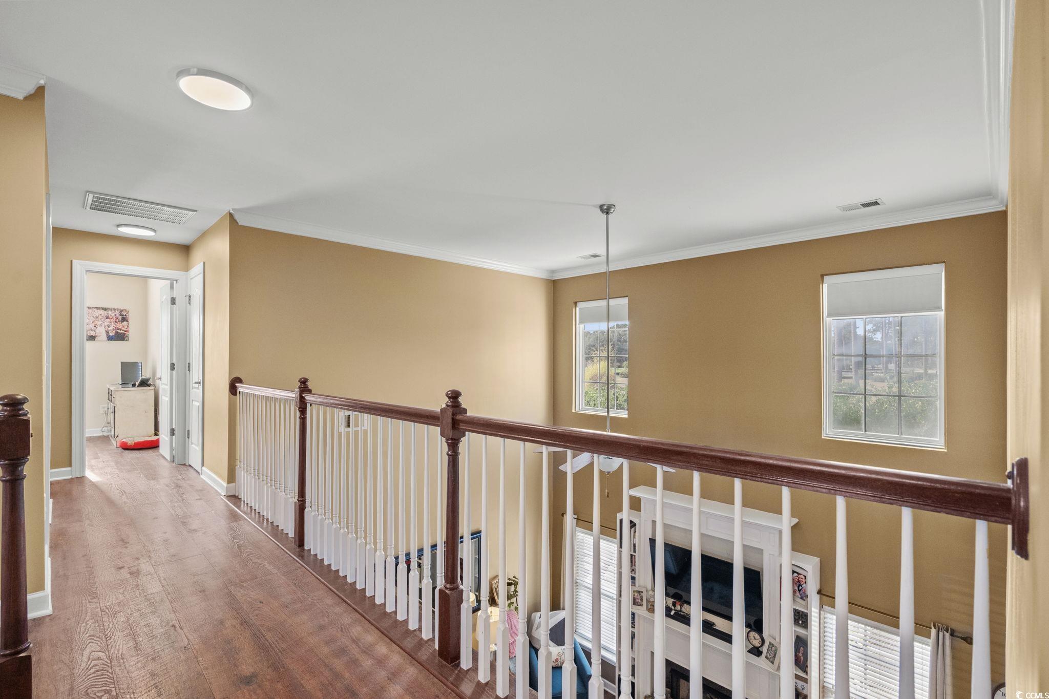 318 Barlow Court Conway, SC 29526 - Photo 17 of 36 Hall with wood finished floors and ornamental molding