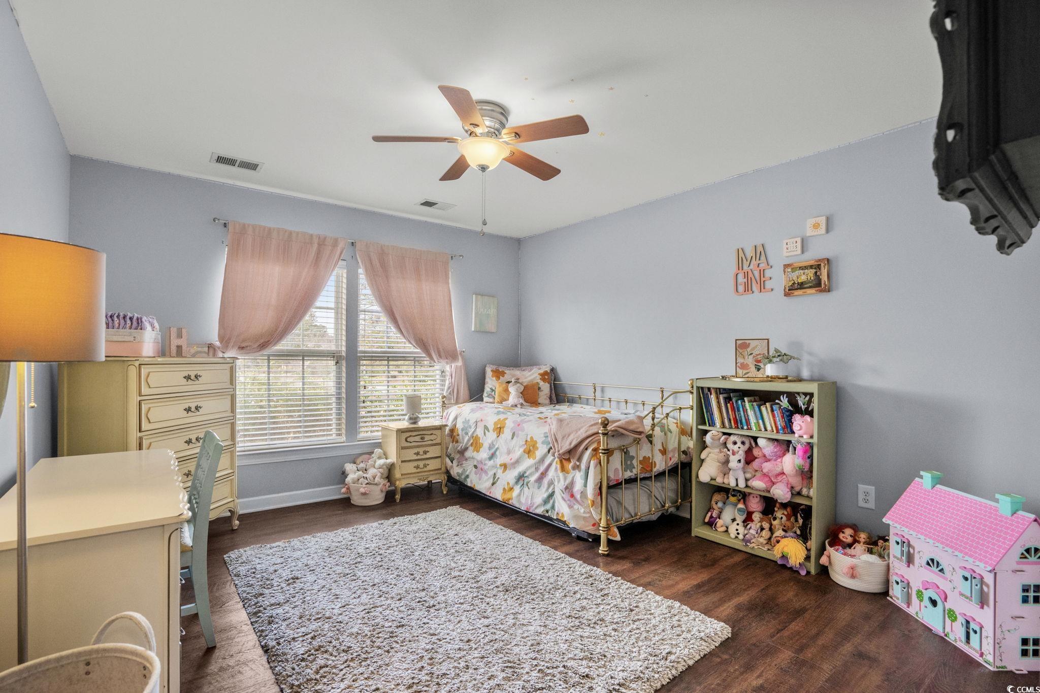 318 Barlow Court Conway, SC 29526 - Photo 19 of 36 Bedroom with dark wood-type flooring and a ceiling fan