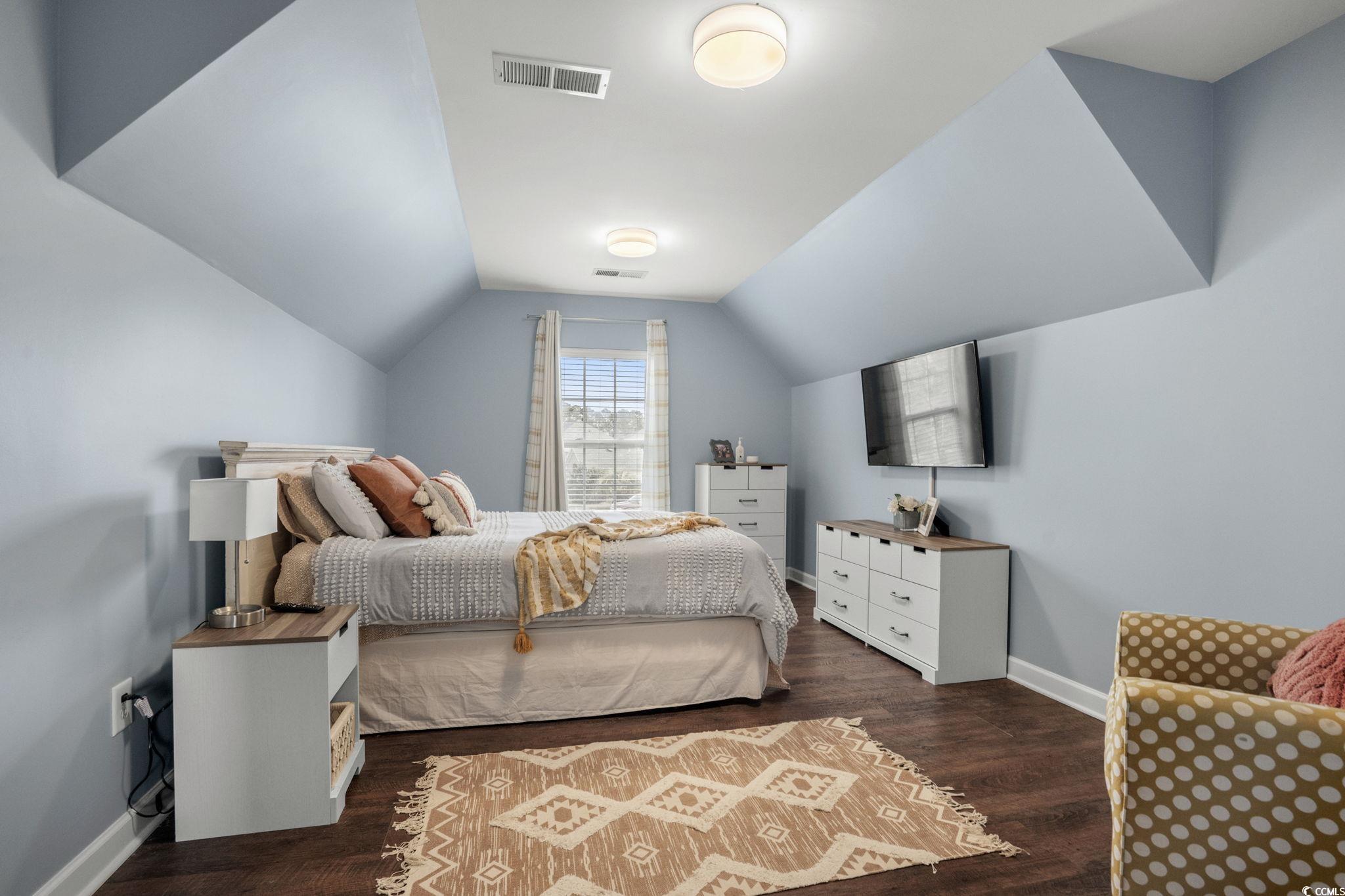 318 Barlow Court Conway, SC 29526 - Photo 20 of 36 Bedroom featuring lofted ceiling and dark wood finished floors
