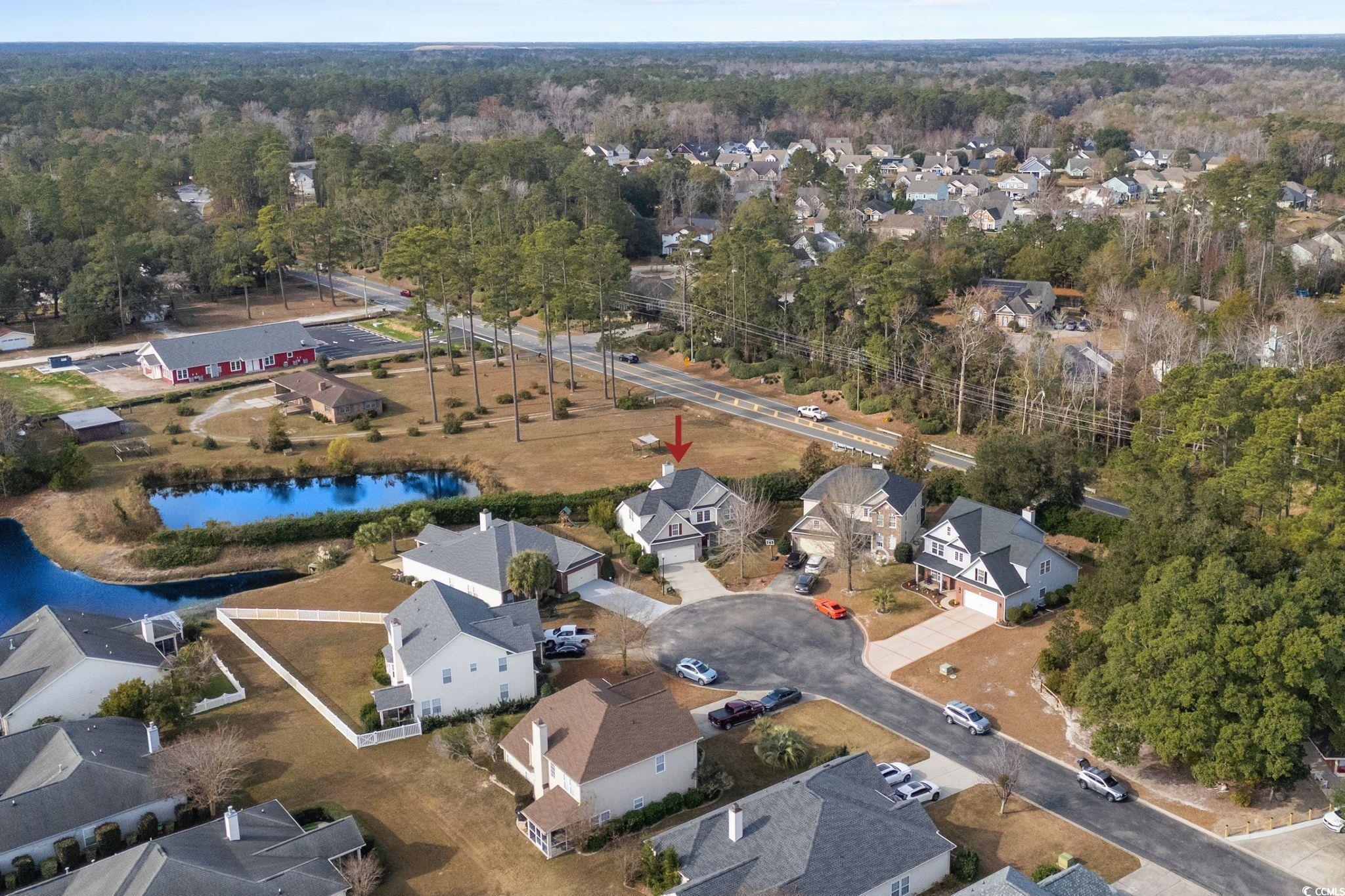 318 Barlow Court Conway, SC 29526 - Photo 31 of 36 Aerial view of property's location with nearby suburban area and a large body of water