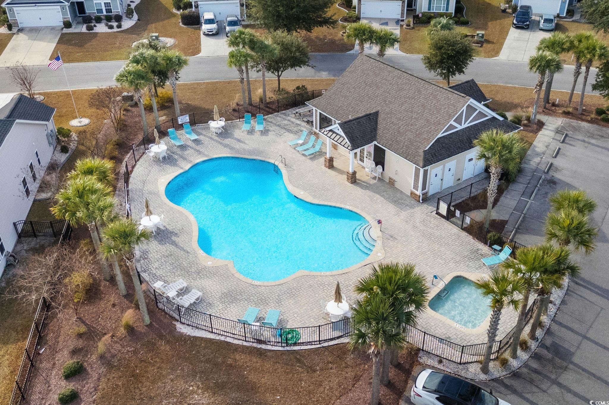 318 Barlow Court Conway, SC 29526 - Photo 33 of 36 Community pool featuring a patio area