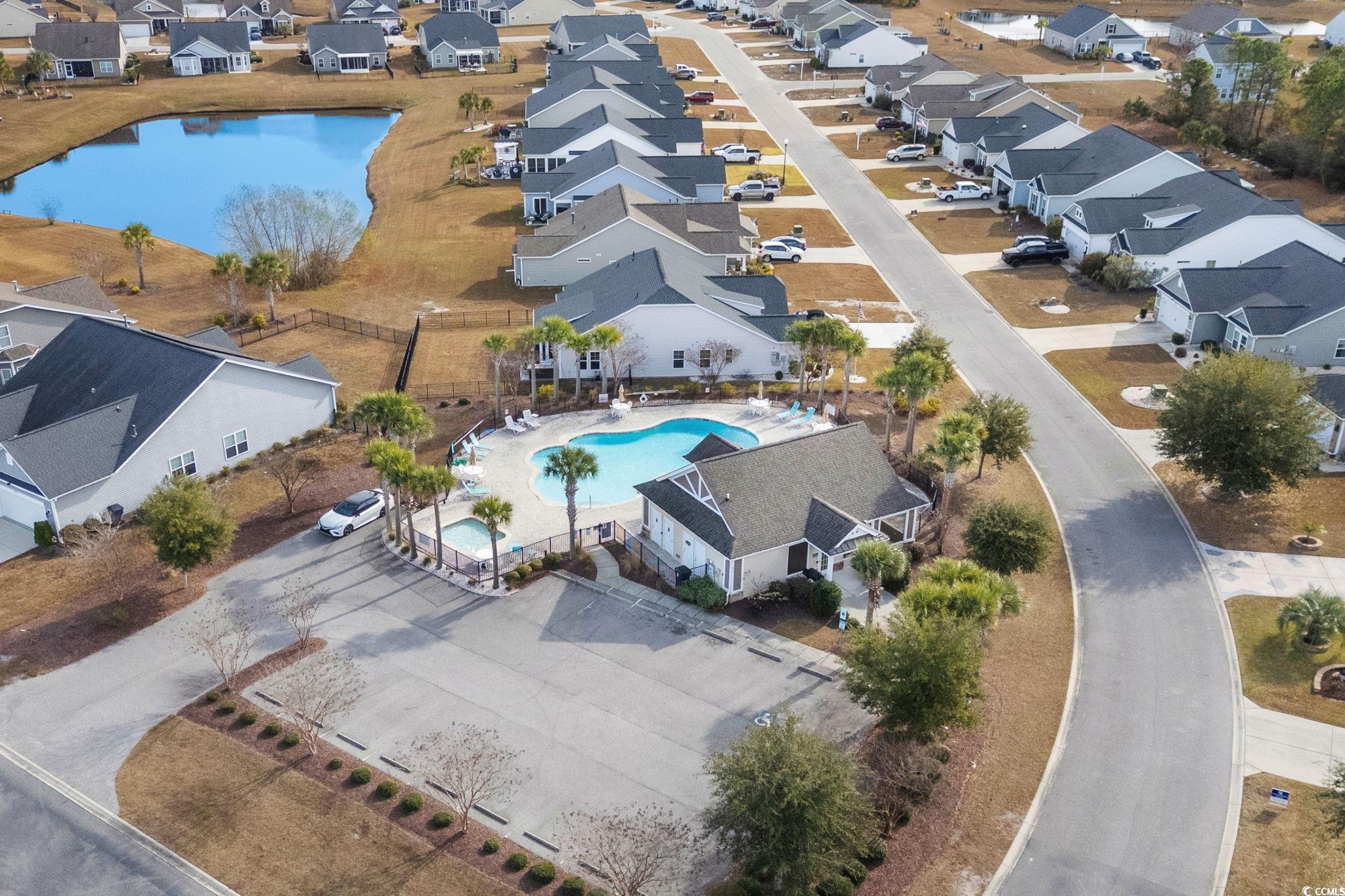 318 Barlow Court Conway, SC 29526 - Photo 34 of 36 Aerial perspective of suburban area with a pool area and a large body of water