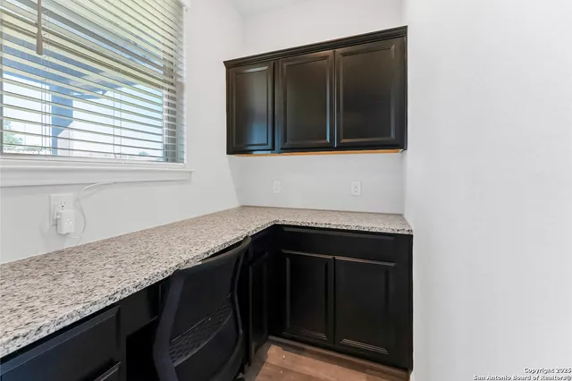 a kitchen with a sink and a cabinets