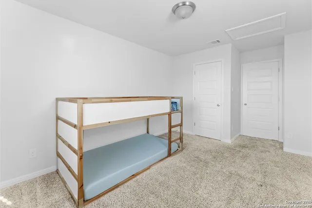 a view of an empty room and workspace