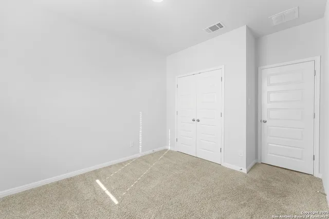 an empty room with closet
