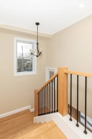 a view of hallway with windows