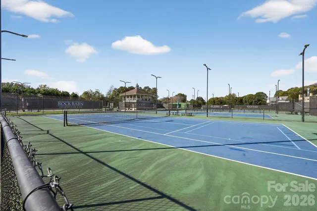 a view of an outdoor space and tennis court