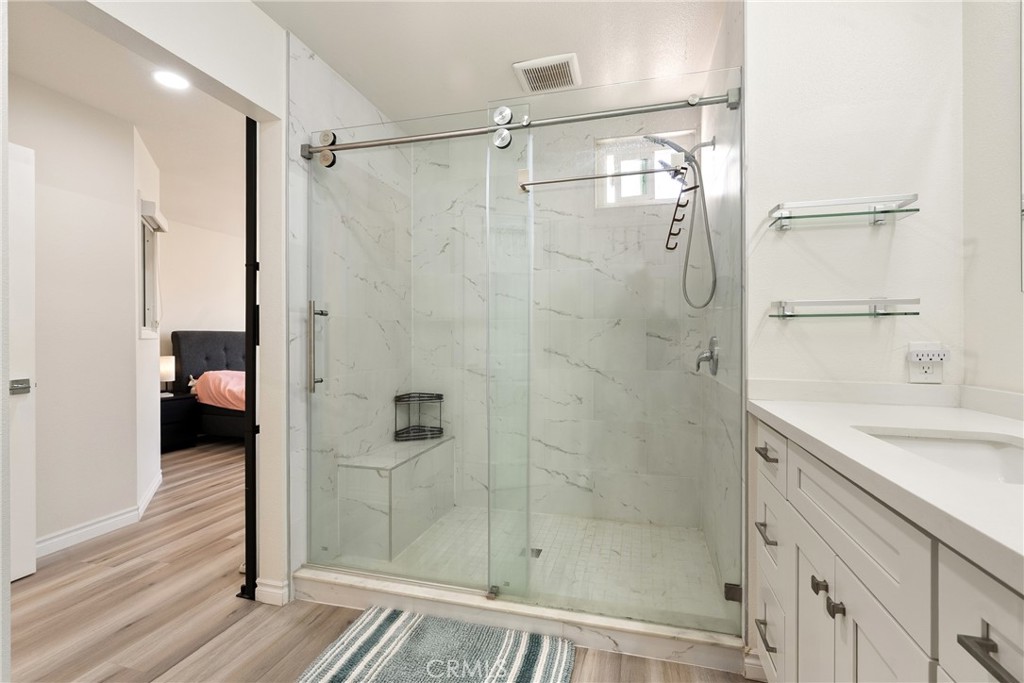 24 Rue De Nicole Lake Forest, CA 92610 - Photo 15 of 24 a bathroom with a shower and a sink