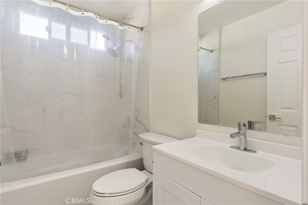 24 Rue De Nicole Lake Forest, CA 92610 - Photo 21 of 24 a bathroom with a sink toilet and shower