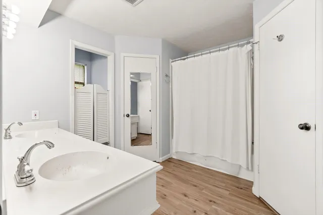 a bathroom with a sink and a tub