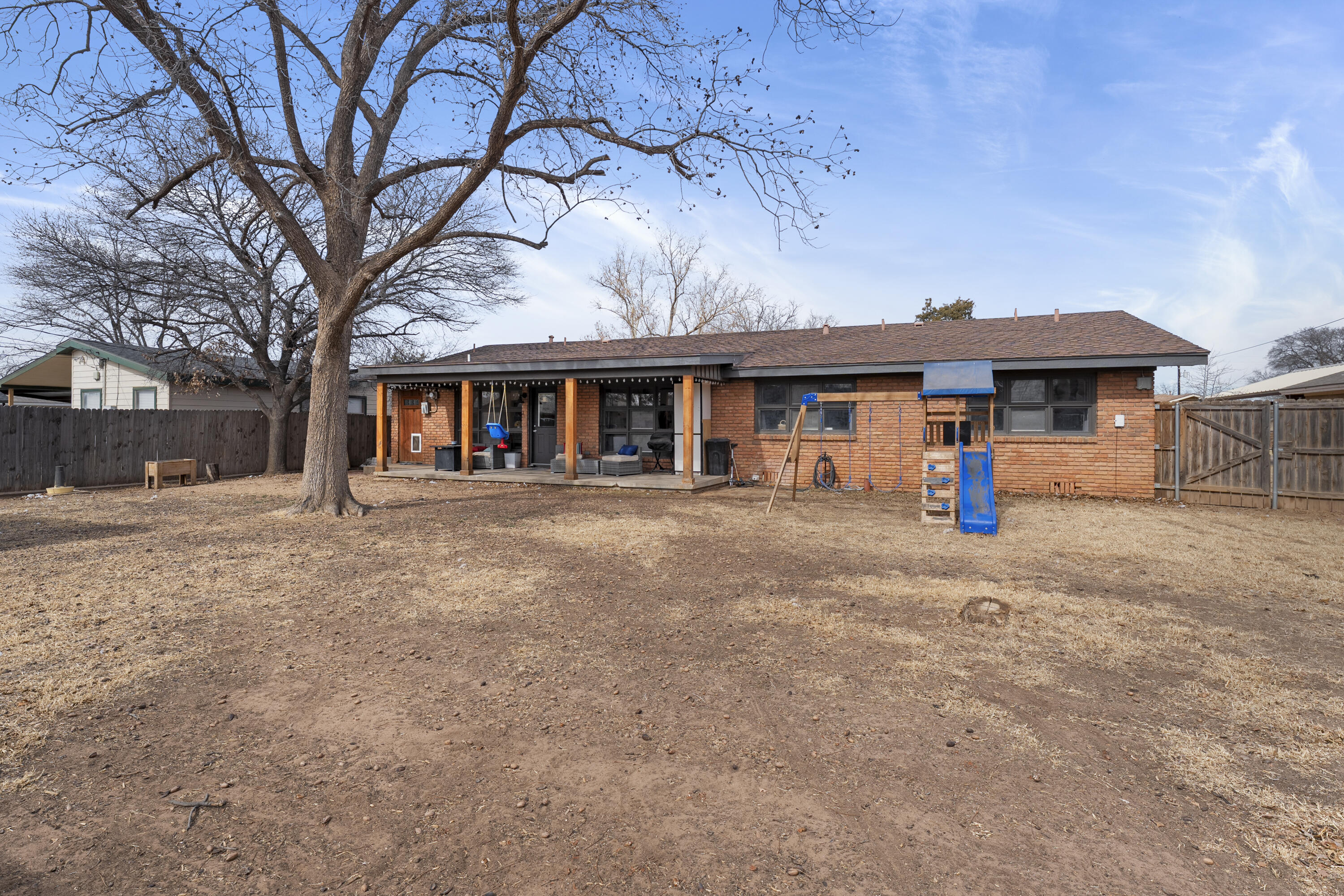 3703 41st Street Lubbock, TX 79413 - Photo 21 of 21 a front view of a house with a yard