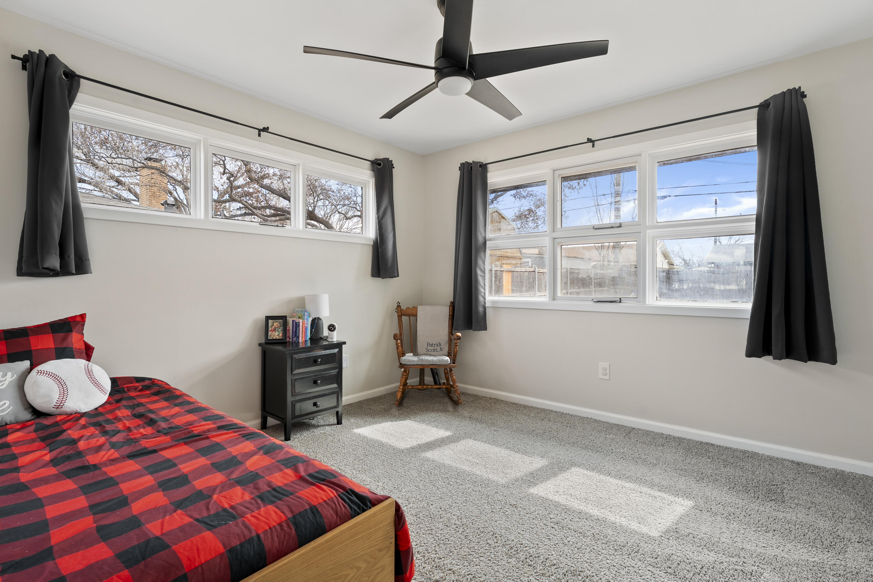 3703 41st Street Lubbock, TX 79413 - Photo 7 of 21 a bedroom with a bed and a window