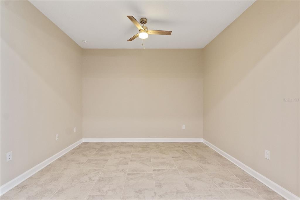 1064 Blackwolf Run Road Davenport, FL 33896 - Photo 16 of 38 a view of an empty room